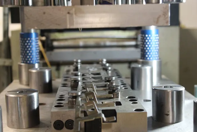 Close-up of a progressive die built in-house